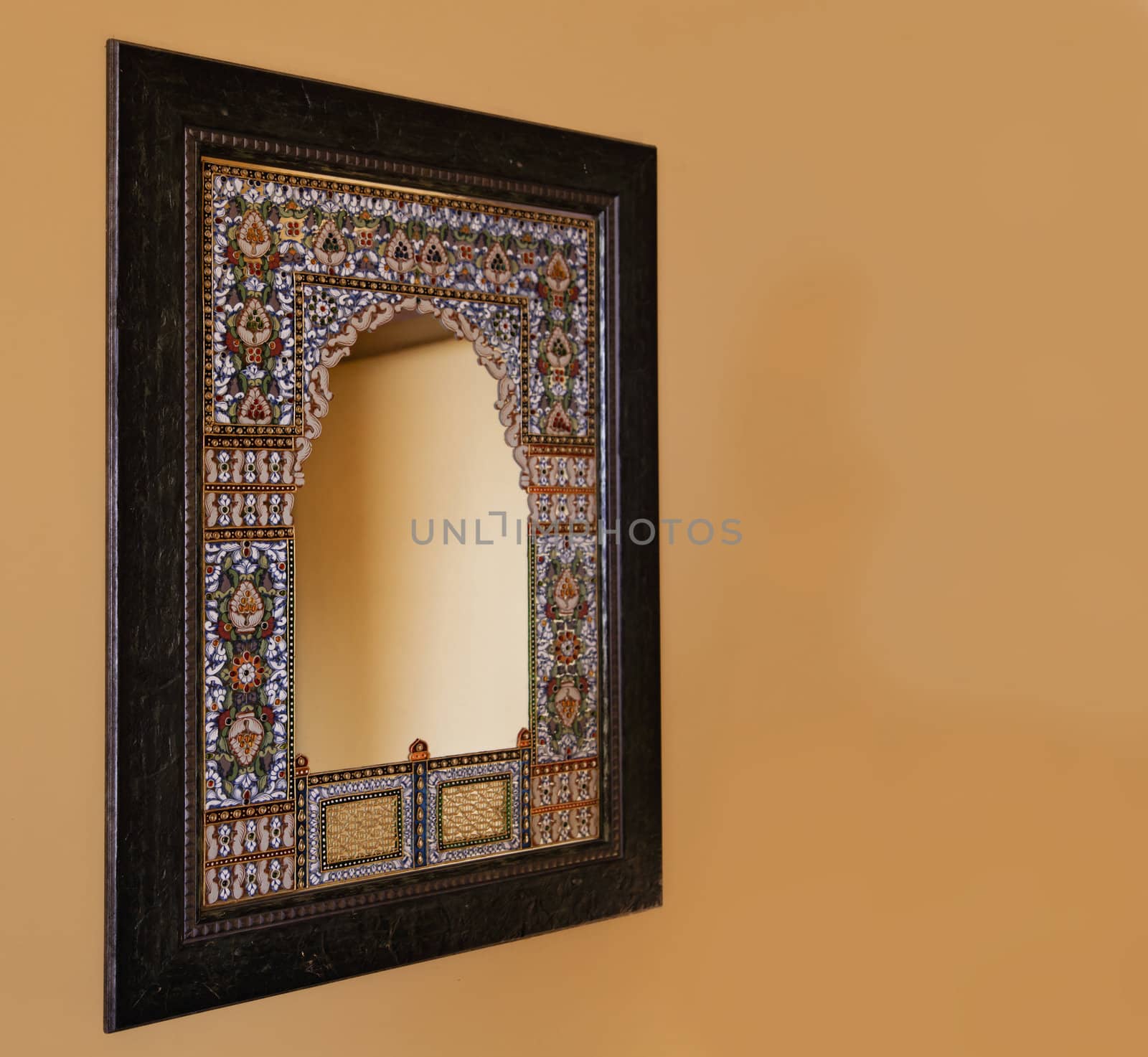 Rajasthan, India, square oak framed indigenous mosaic mirror mounted on a magnolia emulsion painted wall