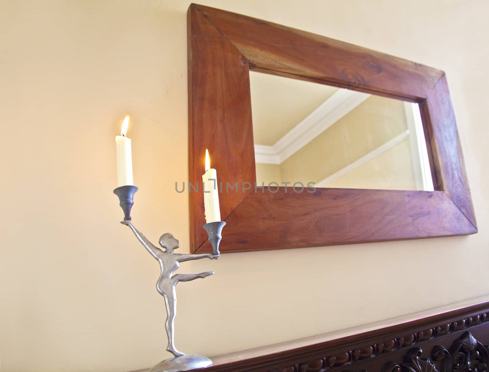 Ballerina Candelabra on the mantelpiece with oak framed mirror and chimney breast