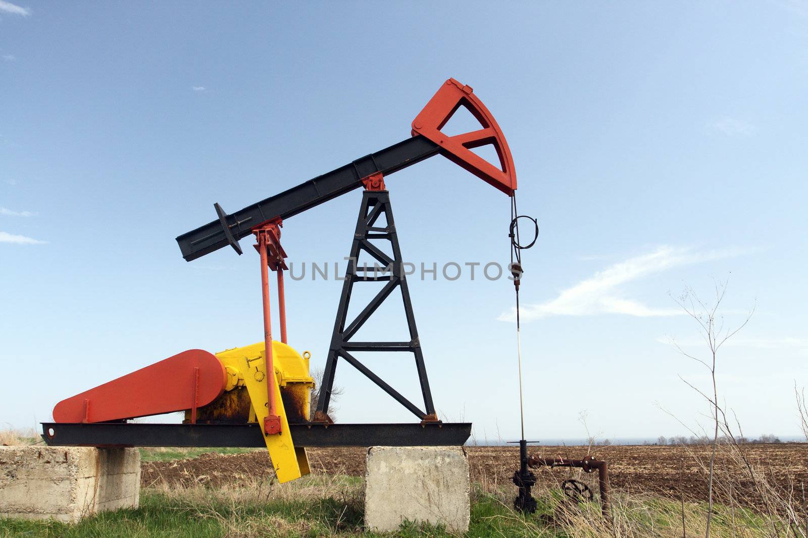  Oil pump jack working in the field