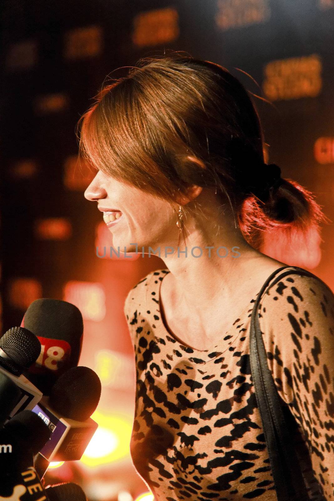 Mumbai, India - December 10, 2011: Editorial - Portrait of Kalki Koechin Bollywood actress, profile view of her being interviewed at a Publicity event