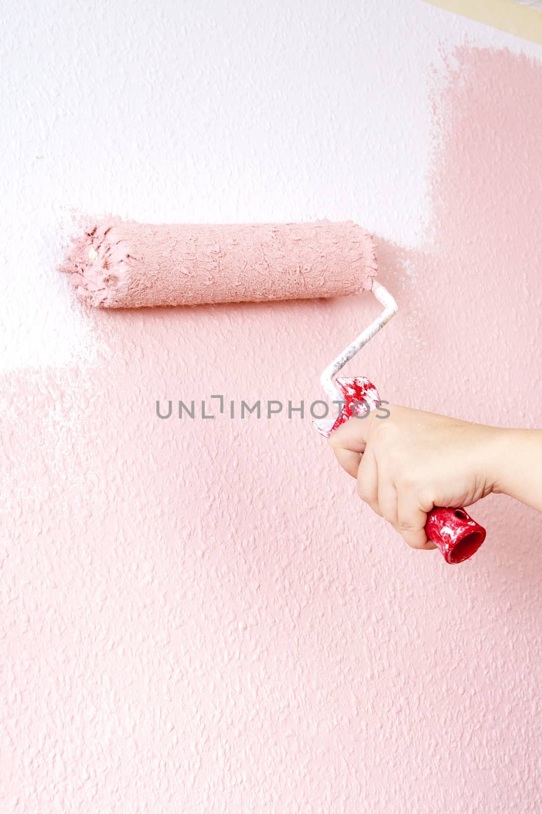 painting a wall in pink