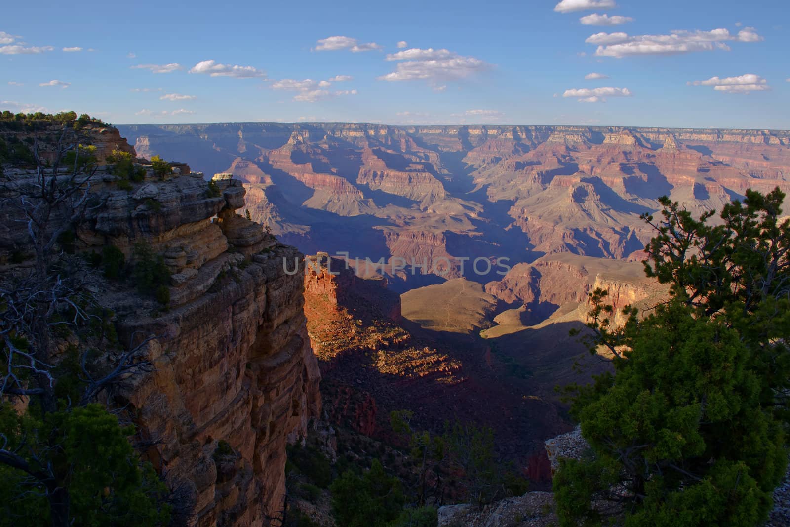 The bright sun shining against the colorful rock walls made for a majestic view from the south rim of the Grand Canyon.