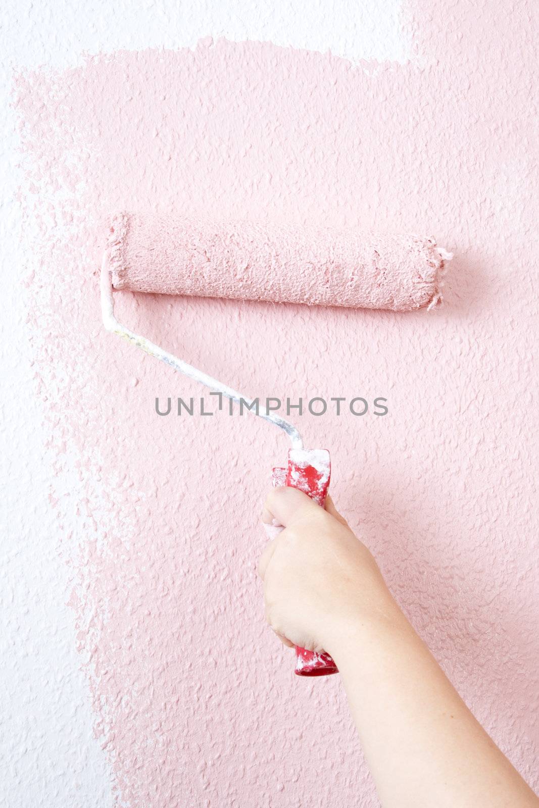 painting a wall in pink