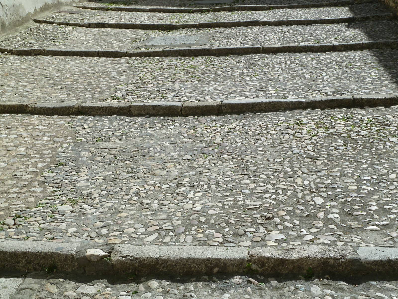 old cobbled steps in bright sunlight