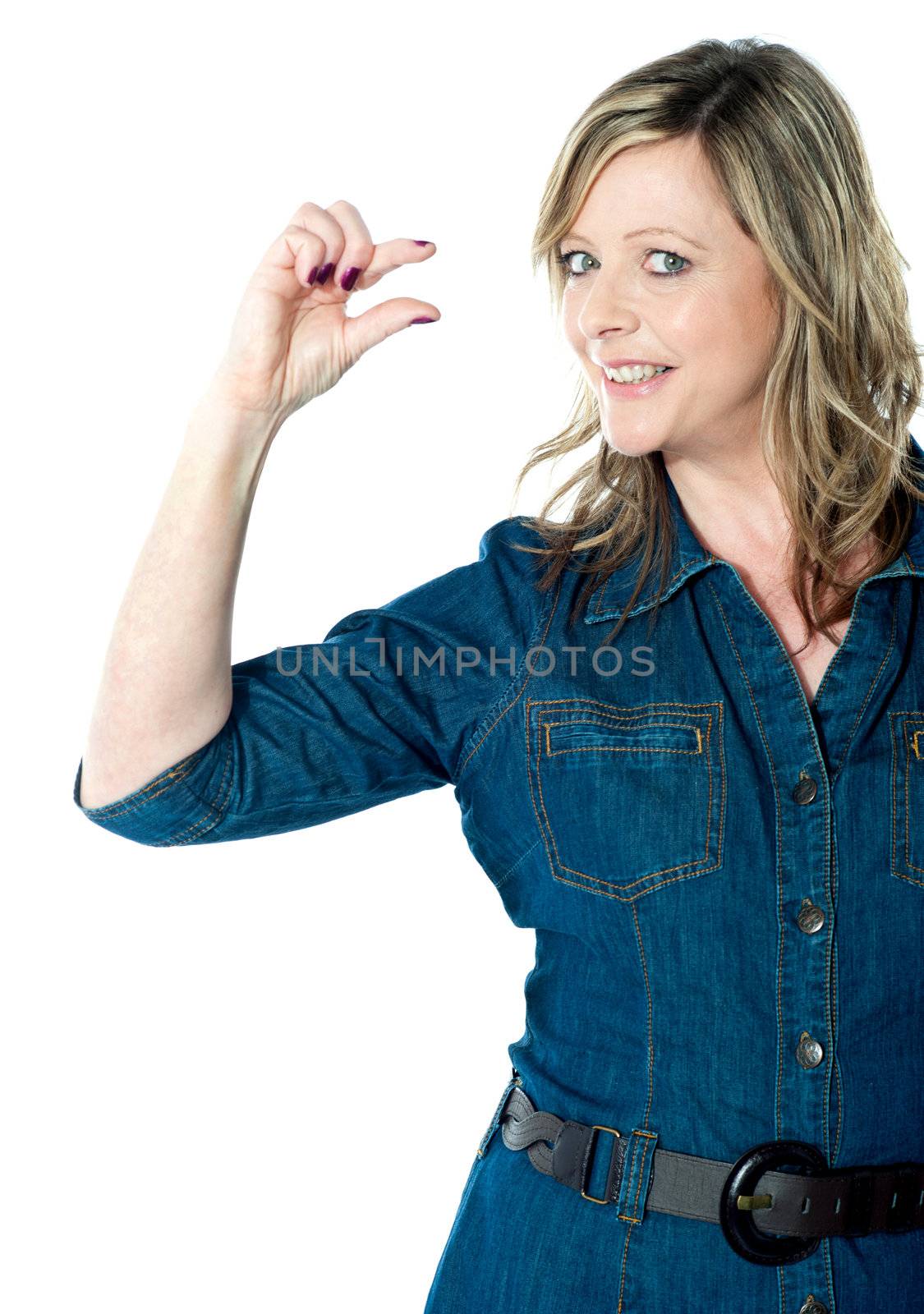 Portrait of beautiful woman showing little bit gesture isolated over white