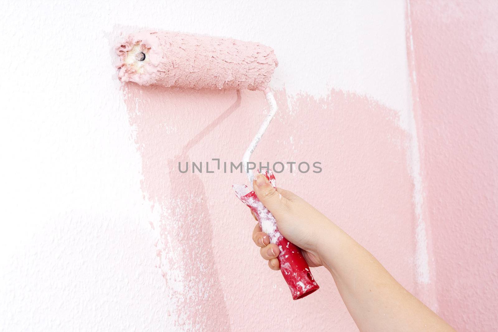 painting a wall in pink