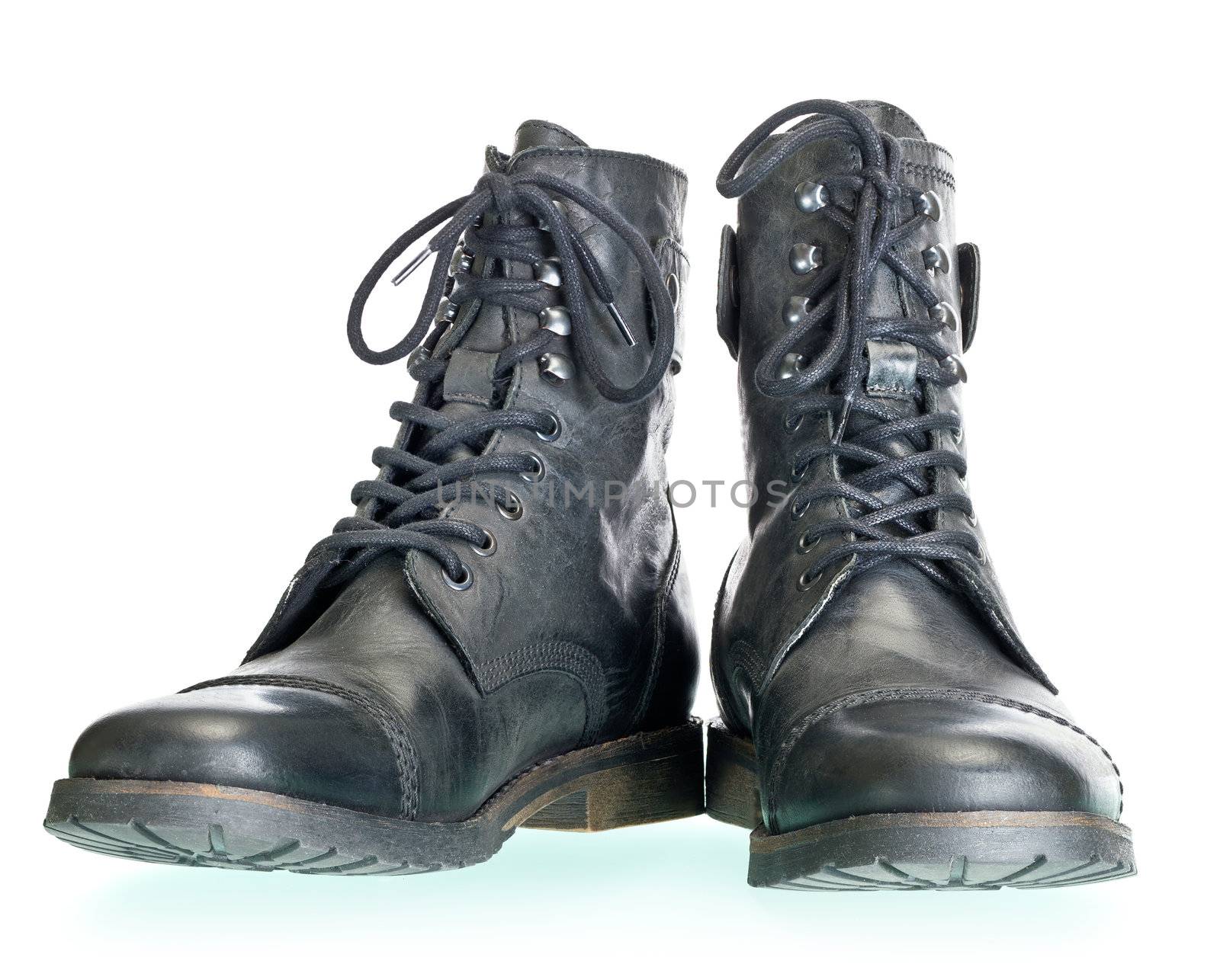 pair of coarse male boots isolated on white background. The image collected from several photos for larger areas of focus.