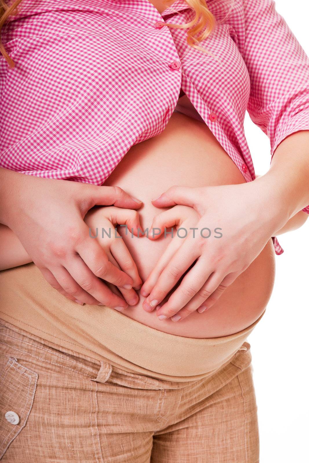 pregnant woman and her daughter - schoolgirl on a white background