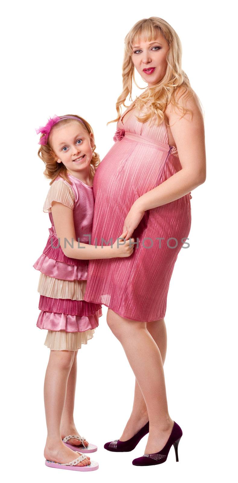 pregnant woman and her daughter - schoolgirl on a white background