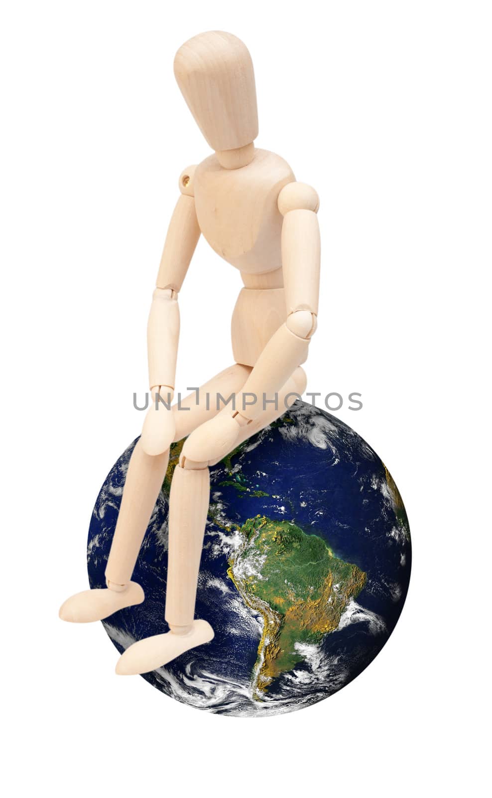 Wooden Puppet Sitting on Earth Globe - Isolated on White. Source image of Earth courtesy of NASA - terms of use: http://visibleearth.nasa.gov/useterms.php