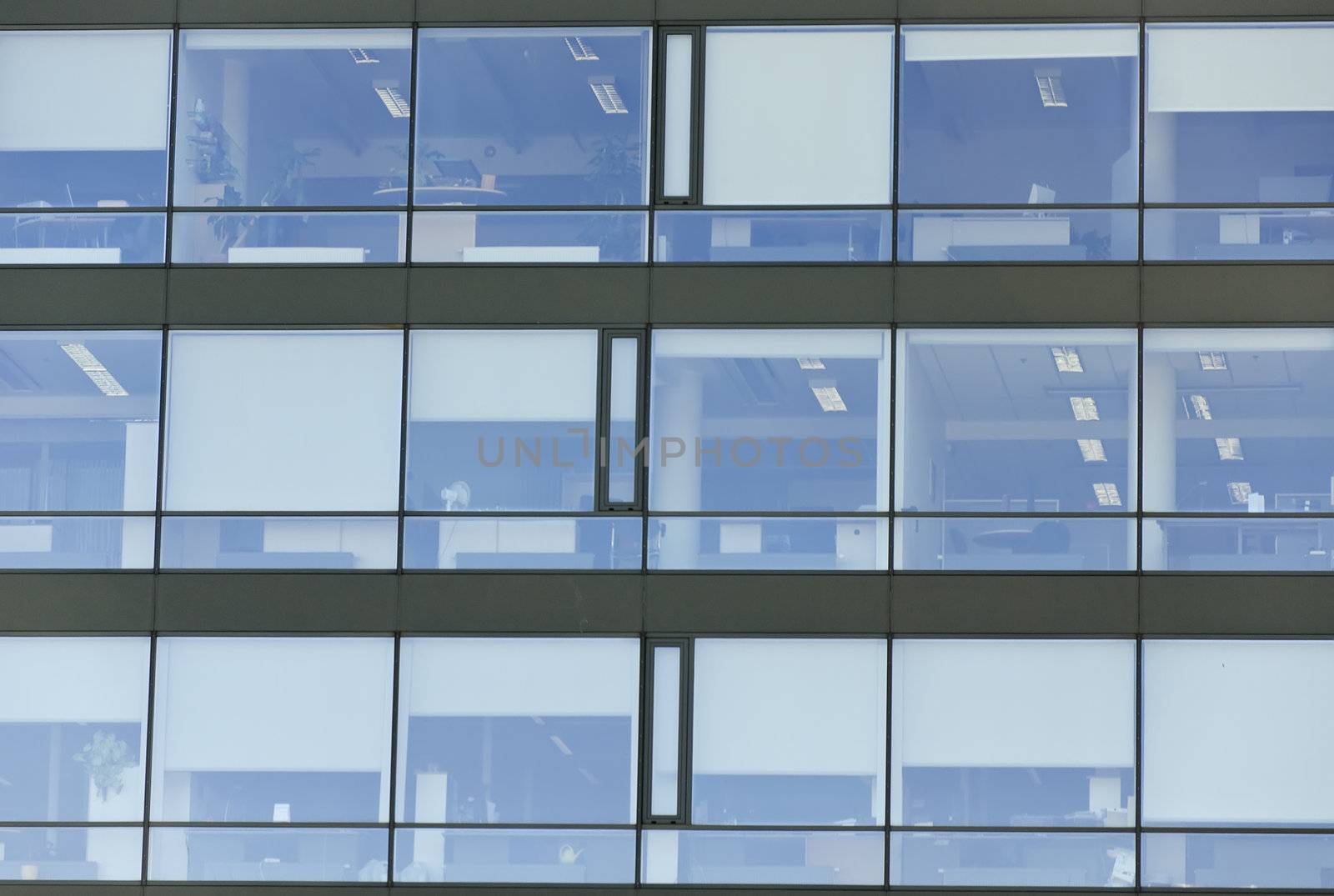 Office rooms from the window. View from the street.