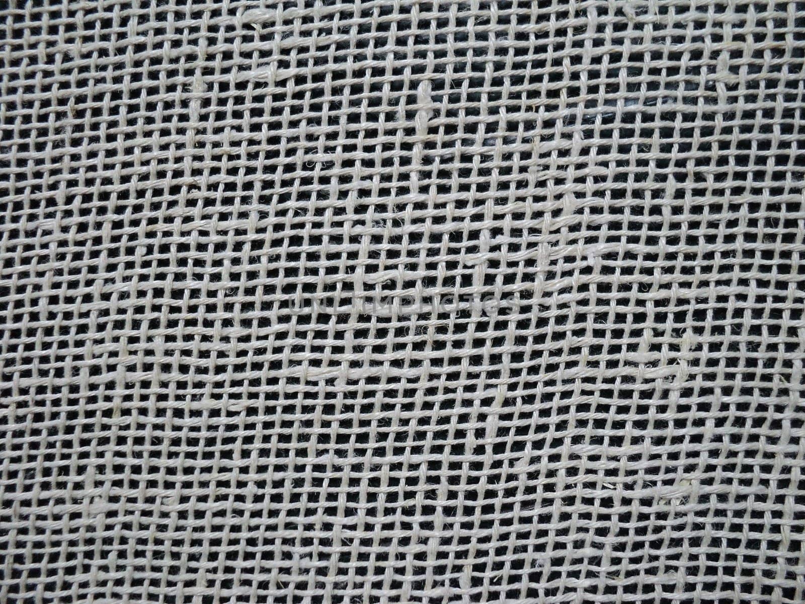 The texture of a light fabric closeup