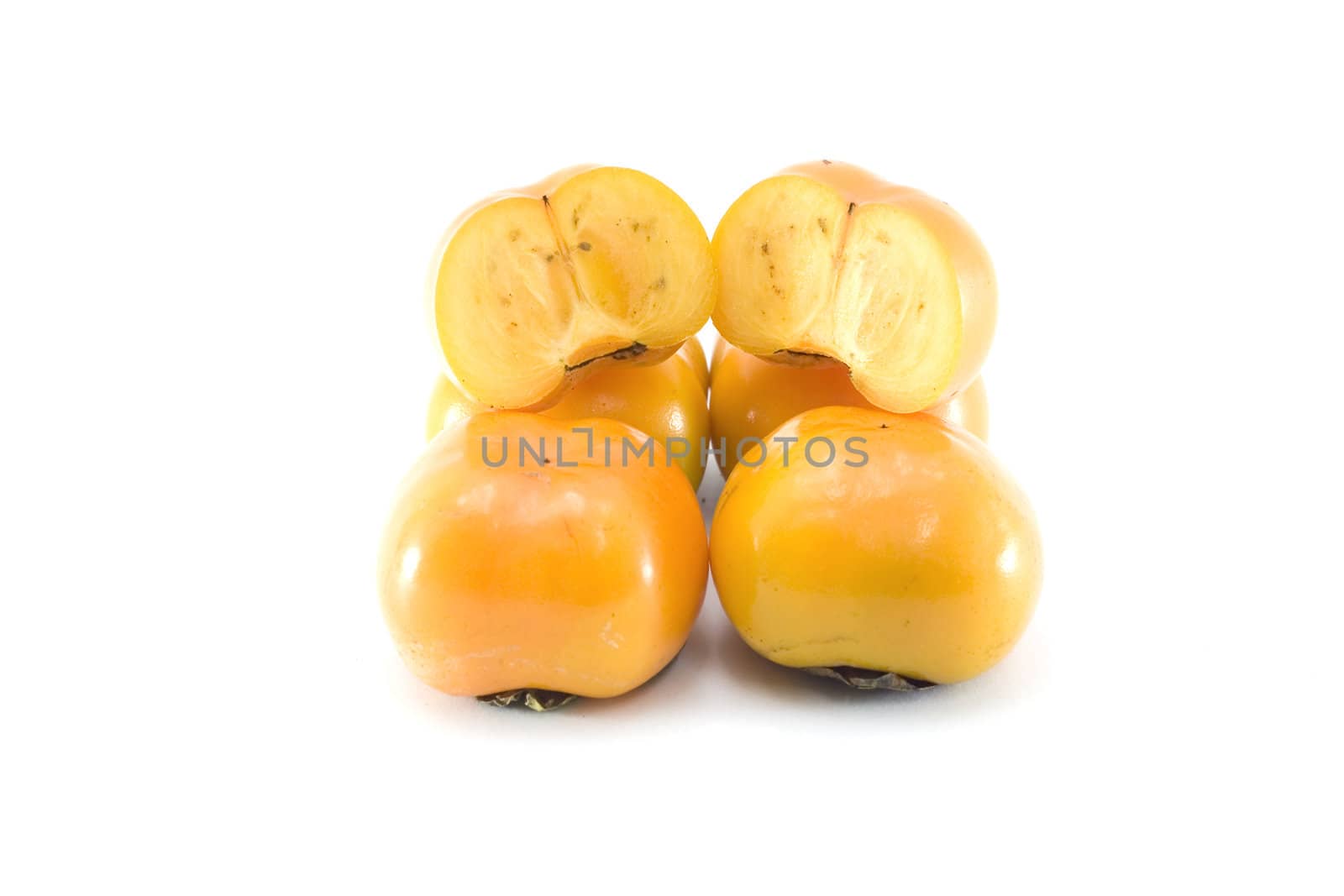 Persimmon sands on white background with isolate.