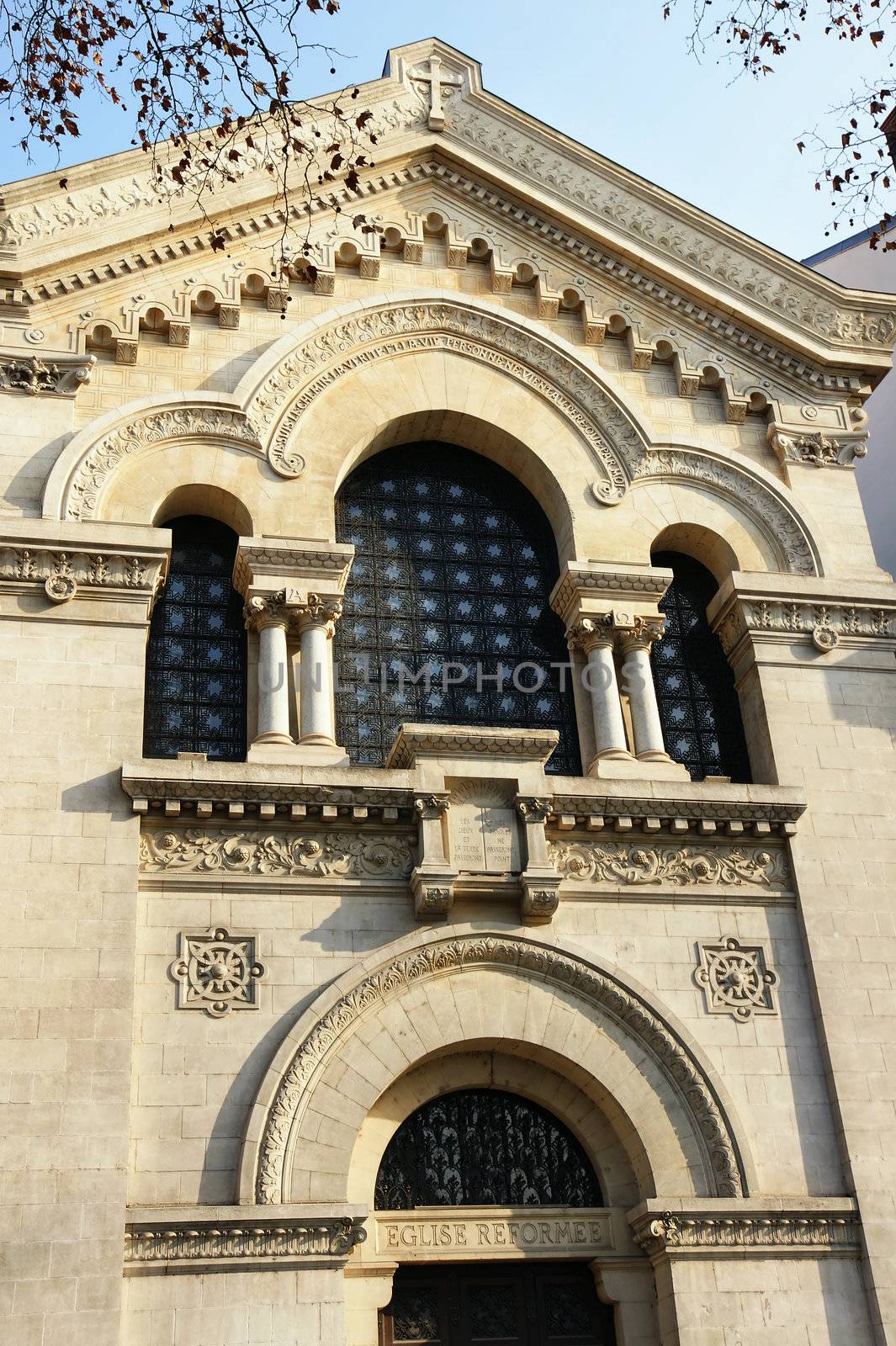 Beautiful French Reformed church facade with stone architecture and lots of details.