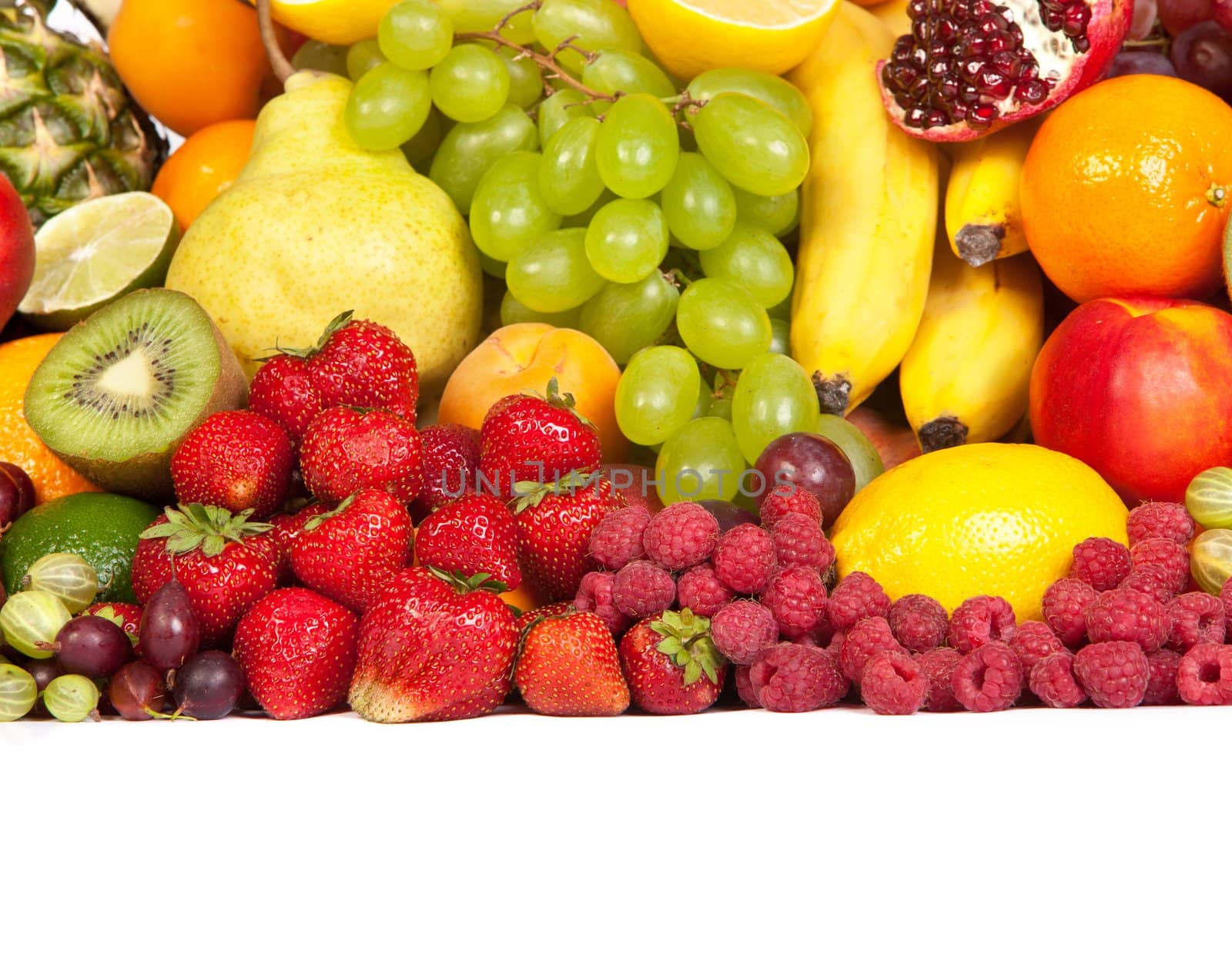 Huge group of fresh fruits isolated on a white background. Shot in a studio