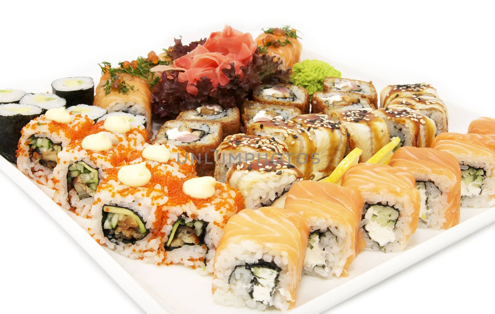 a huge plate of sushi on white background