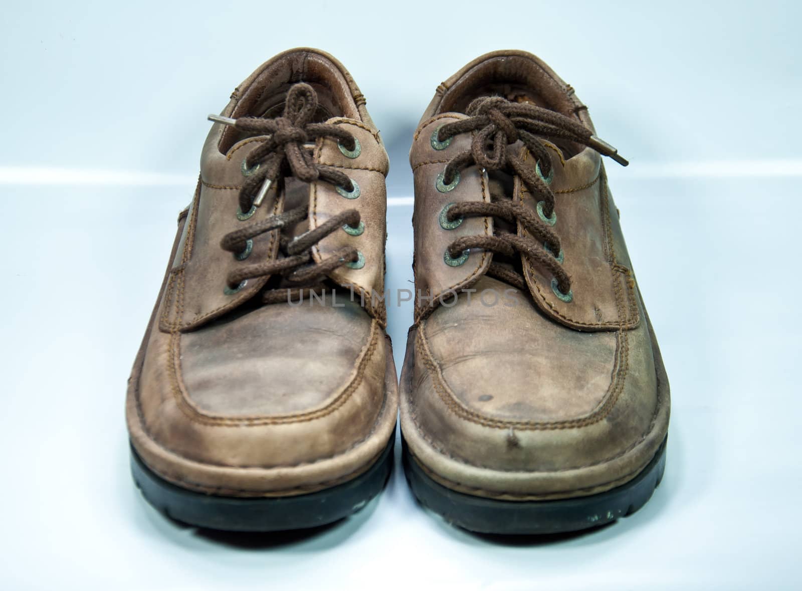 Old brown shoes by buffaloboy