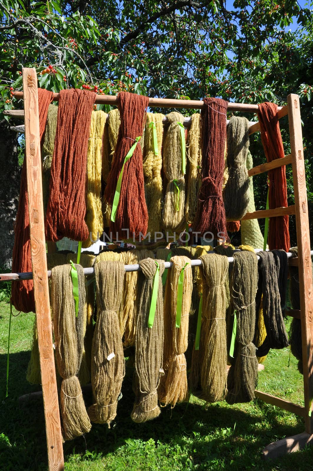 Handmade yarn on a wooden rack