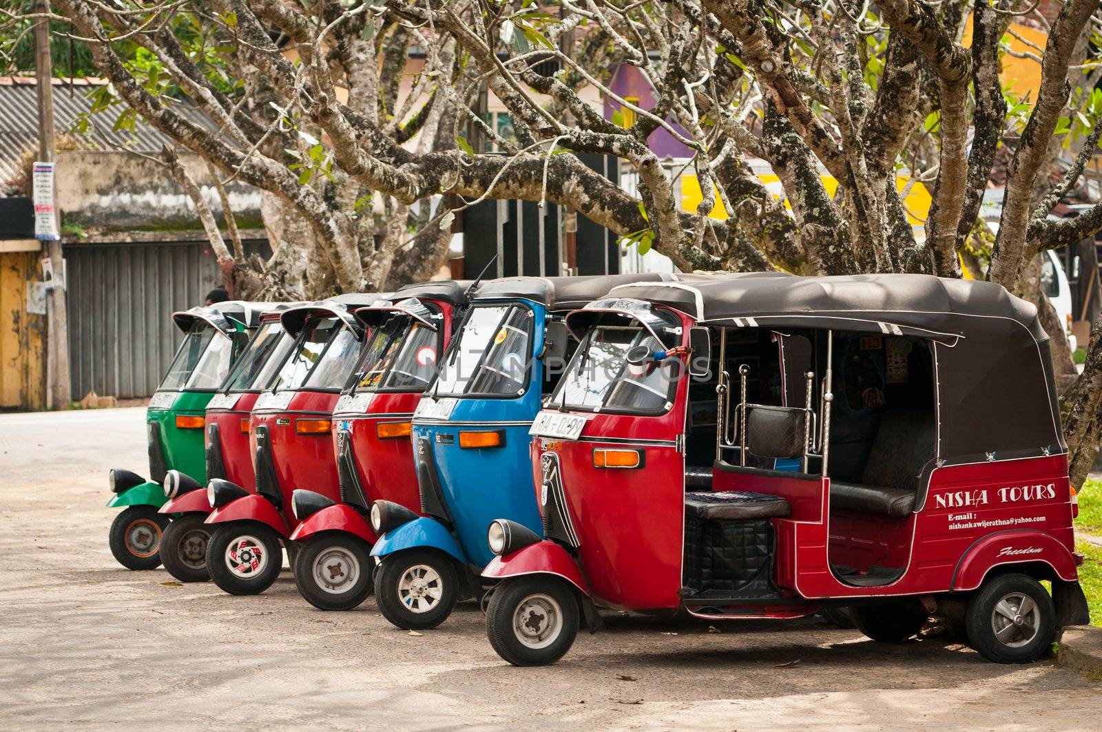 Tuk-tuk is a popular asian transport as taxi. by iryna_rasko