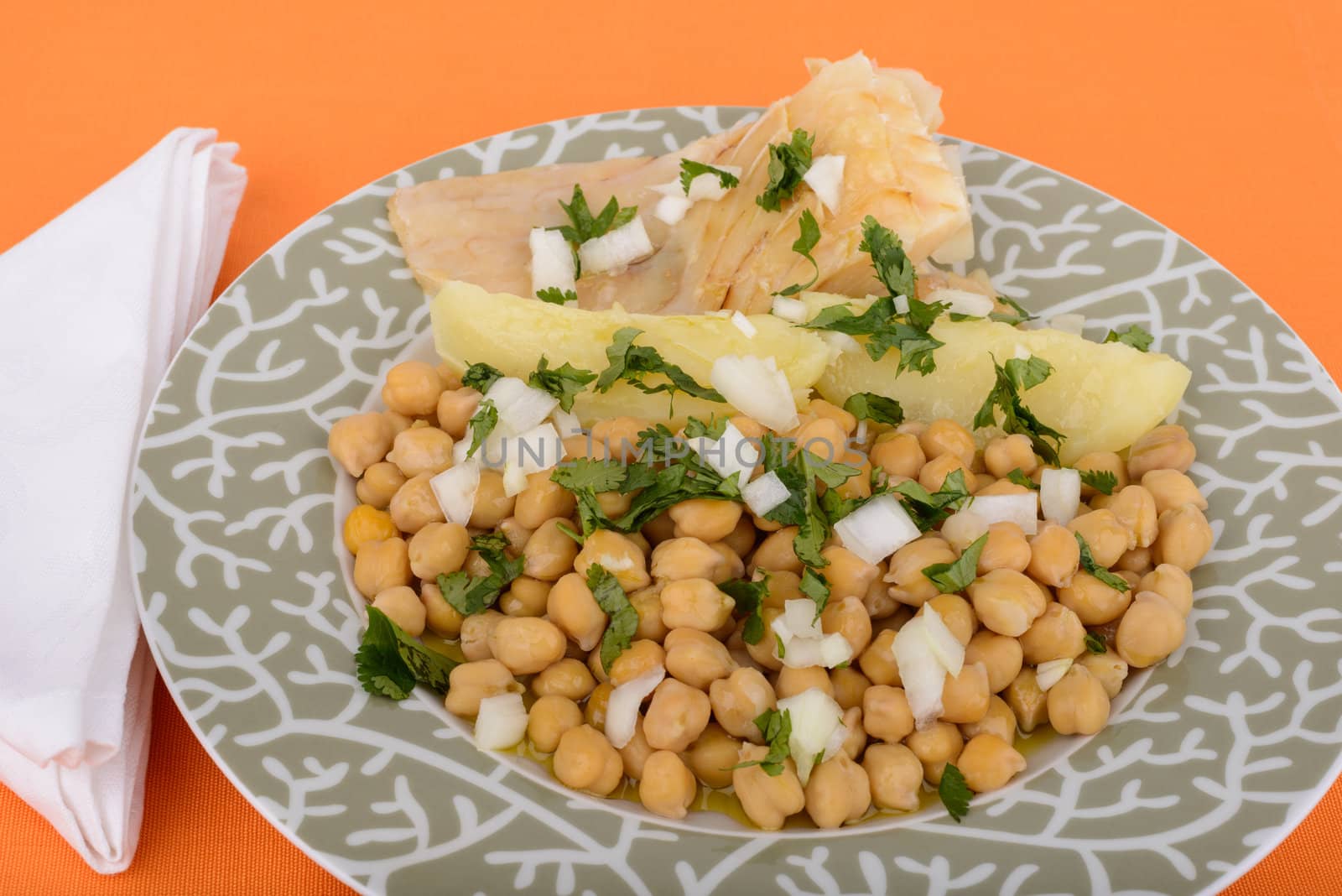 Codfish with potato and grain. Dish typical of Portuguese cuisine