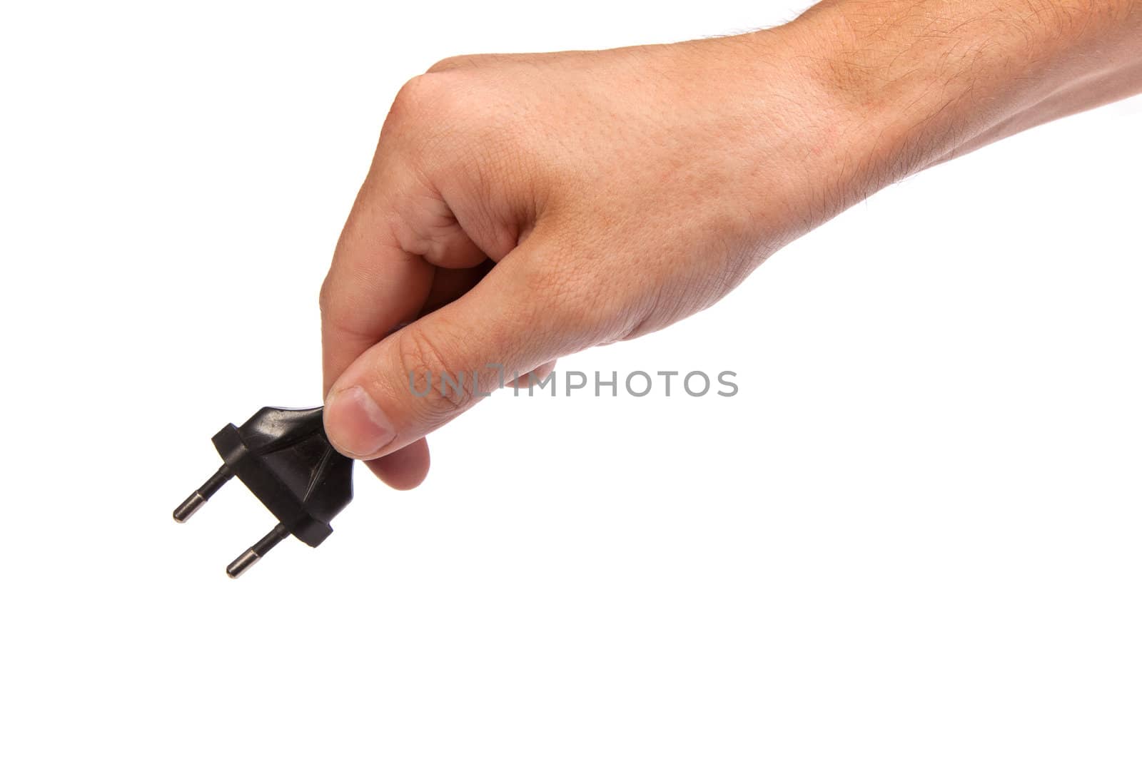 Man is holding a black outlet in the hand isolated on a white background