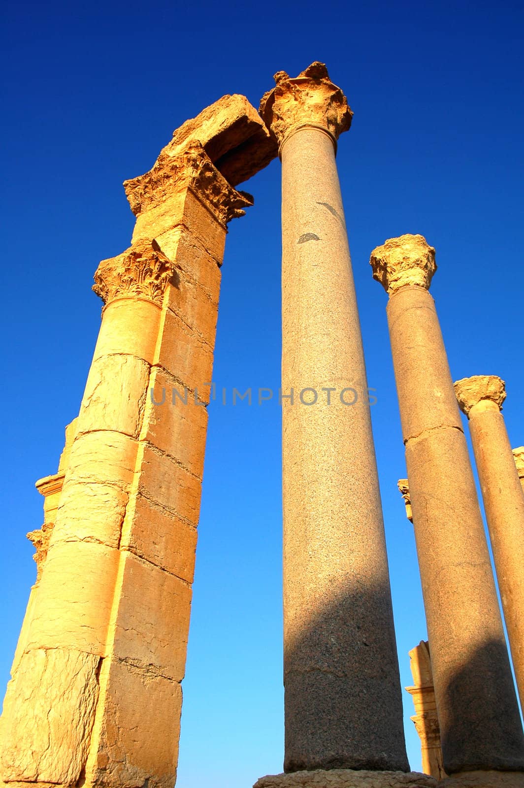 Relics Palmyra in Syria against blue sky. Ancient Roman time town in Palmyra (Tadmor), Syria.