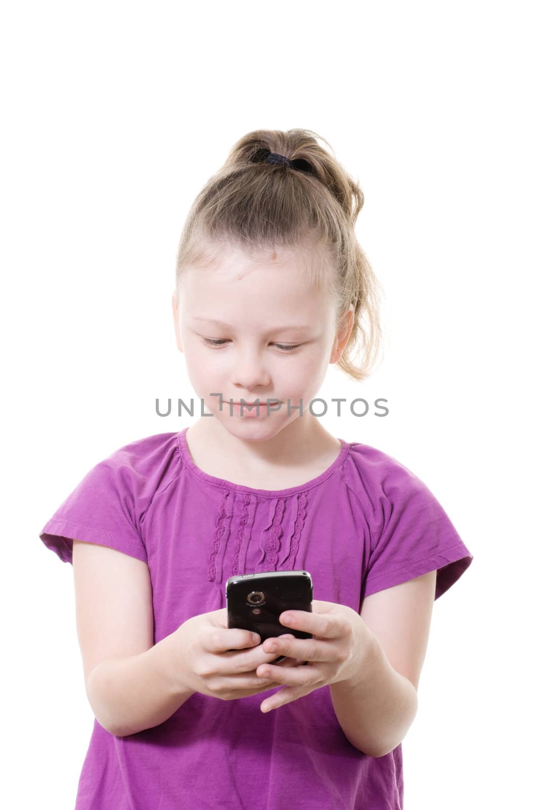 young girl sending a text message