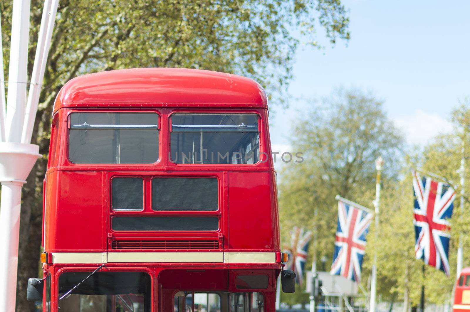 Cropped front shot of London red double deck bus with blank information panel.