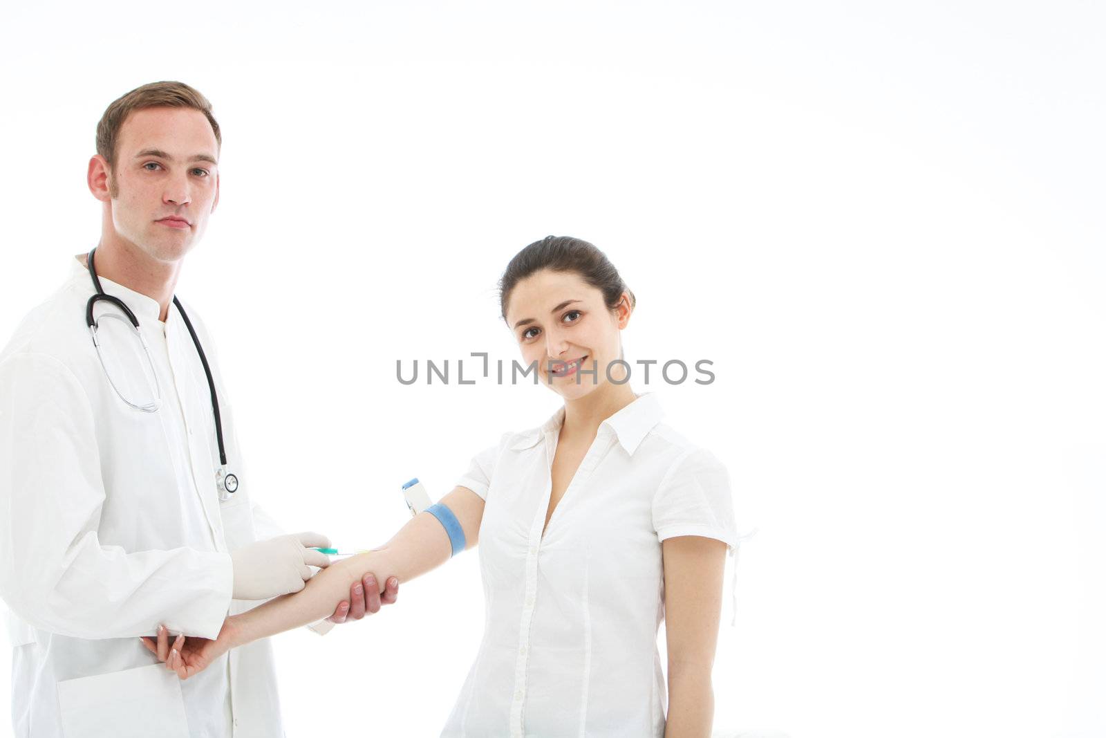 Patient receiving an intravenous injection from a young male doctor or nurse
