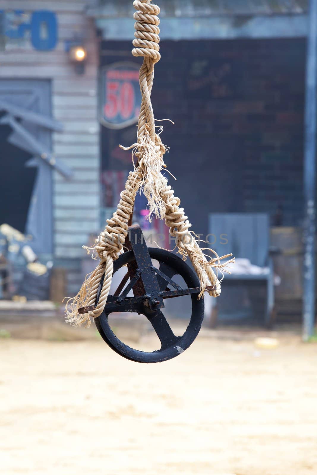 An old dusty steel pulley