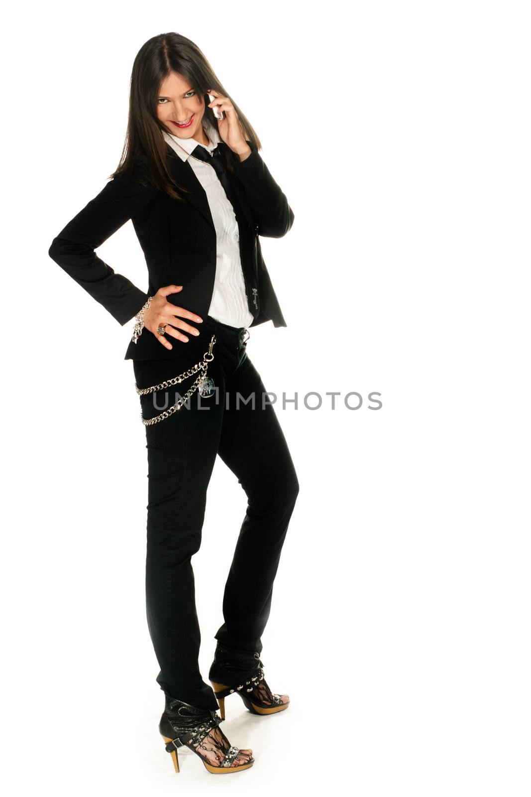 Beautiful young girl standing isolated over white 