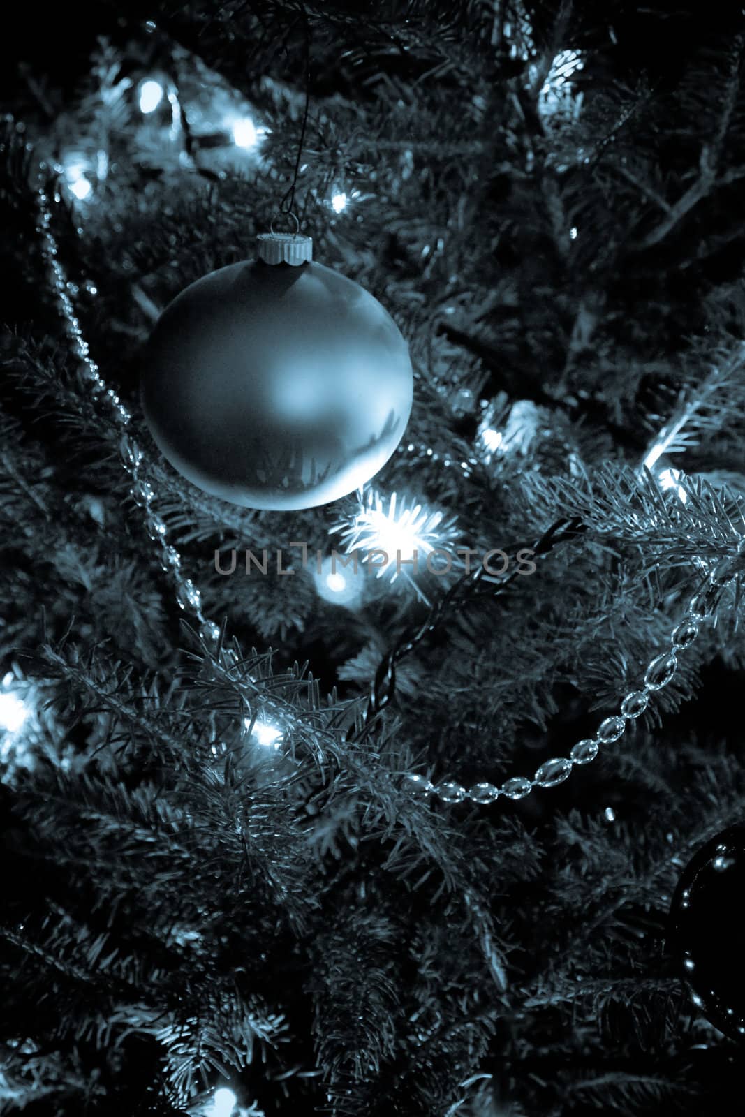 Blue christmas tree with lights background concept
