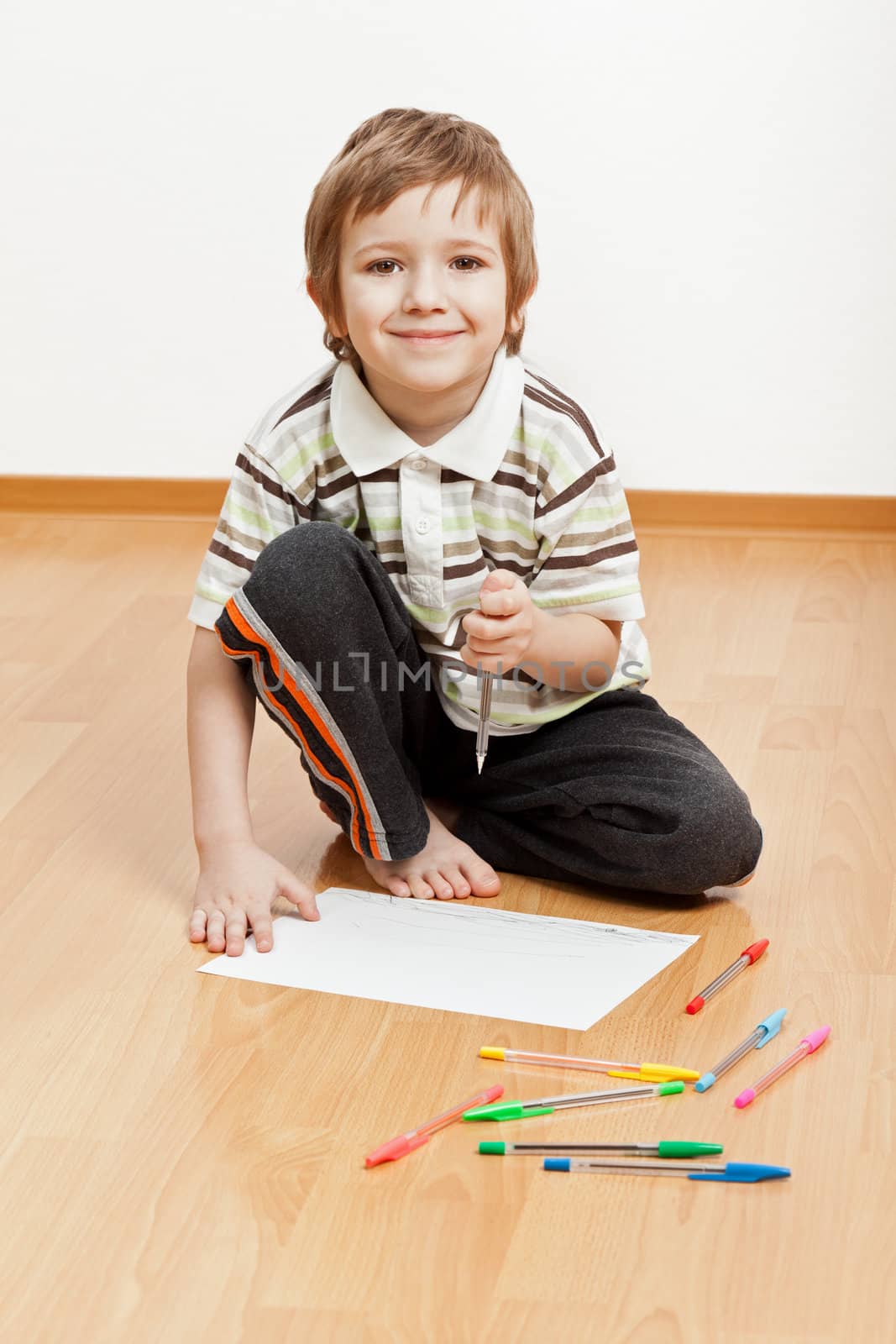 Little child drawing painting or writing letter