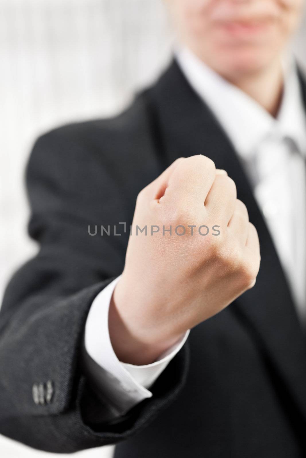 Anger screaming business man hand gesturing fist