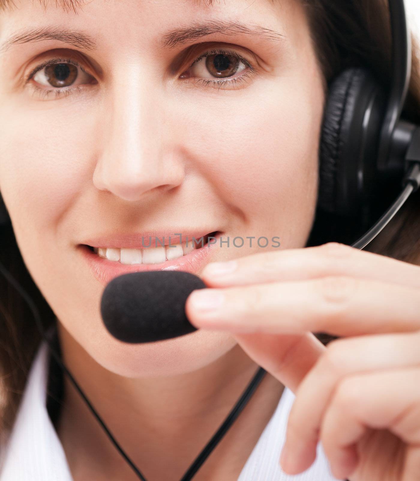 Beauty smiling business woman with headphones or headset