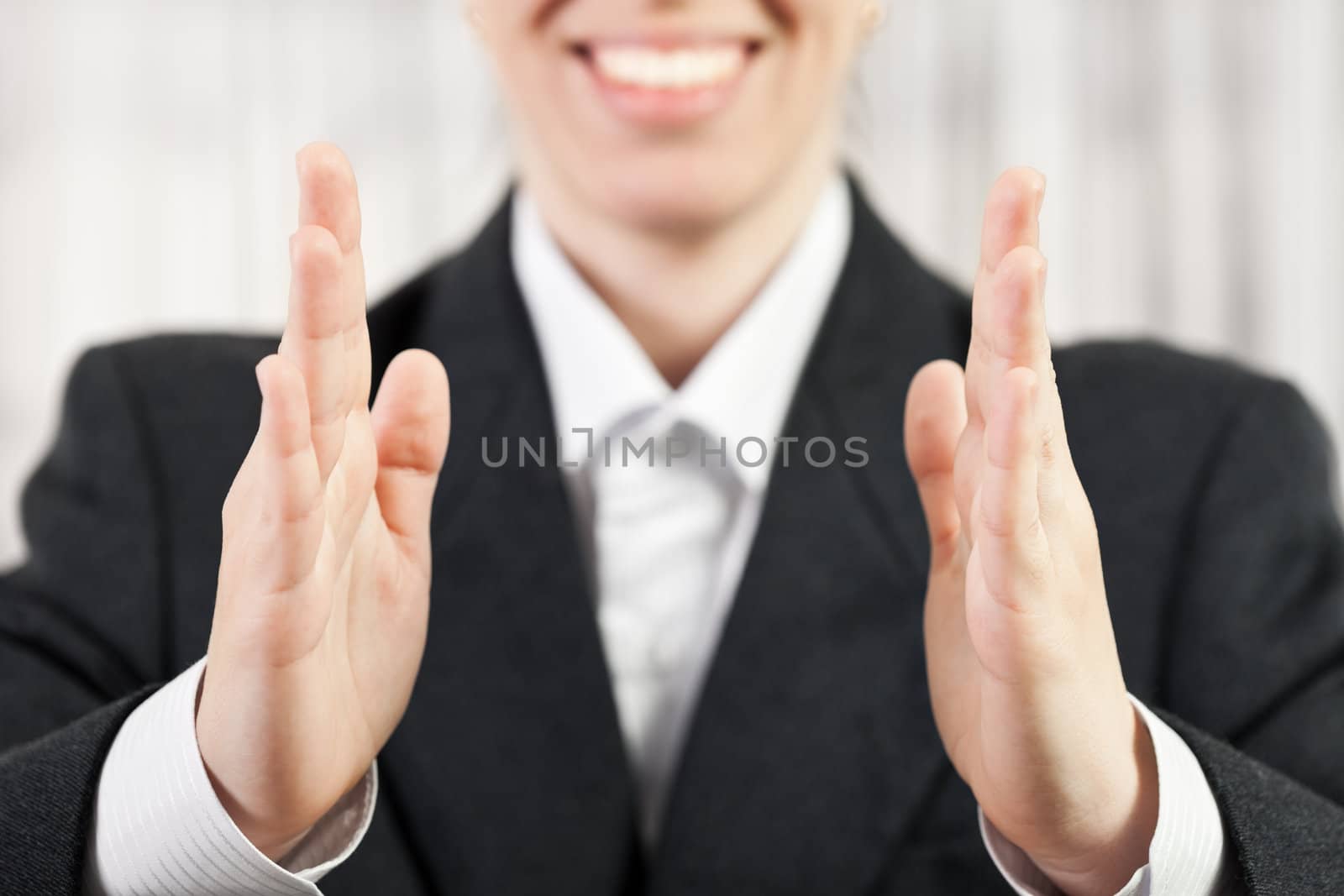 Businesswoman hand showing middle size by ia_64