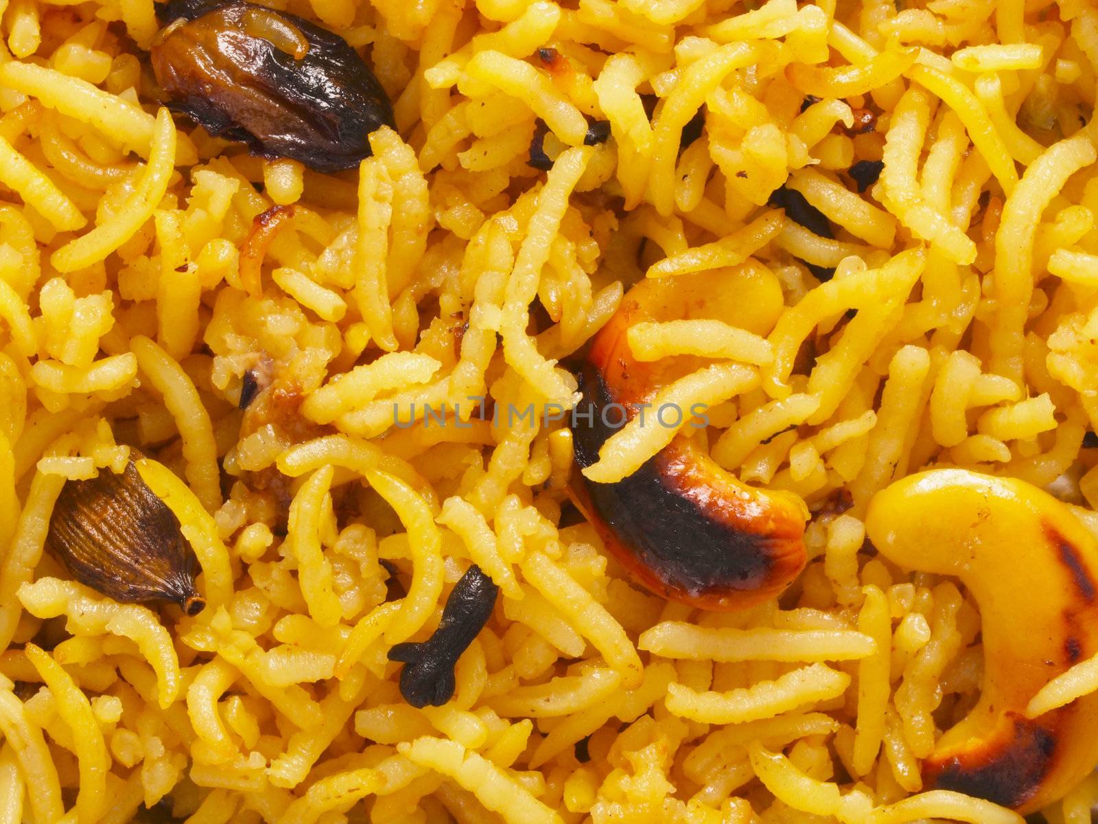 close up of indian turmeric rice food background    