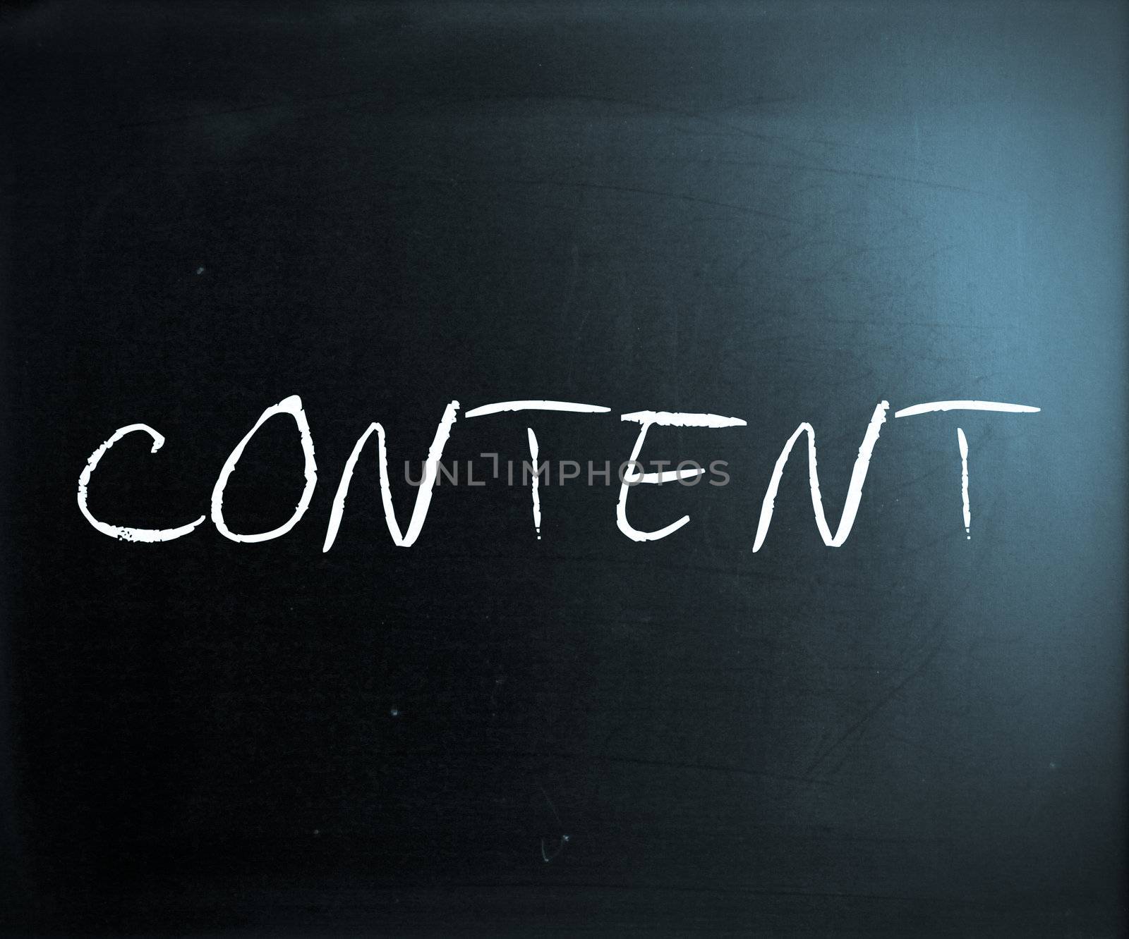 "Content" handwritten with white chalk on a blackboard.