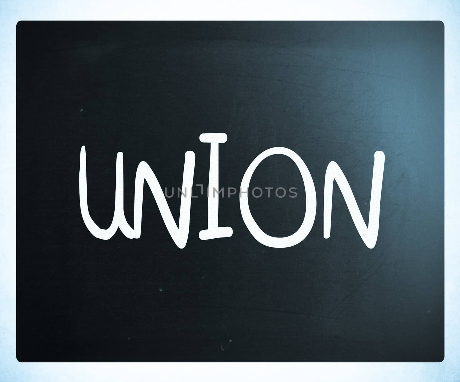 The word "Union" handwritten with white chalk on a blackboard