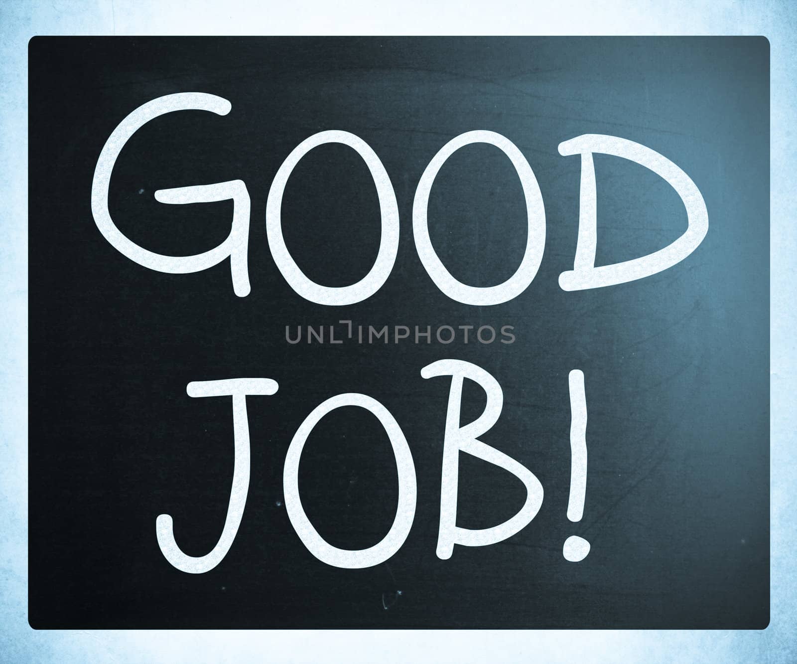 "Good job!" handwritten with white chalk on a blackboard