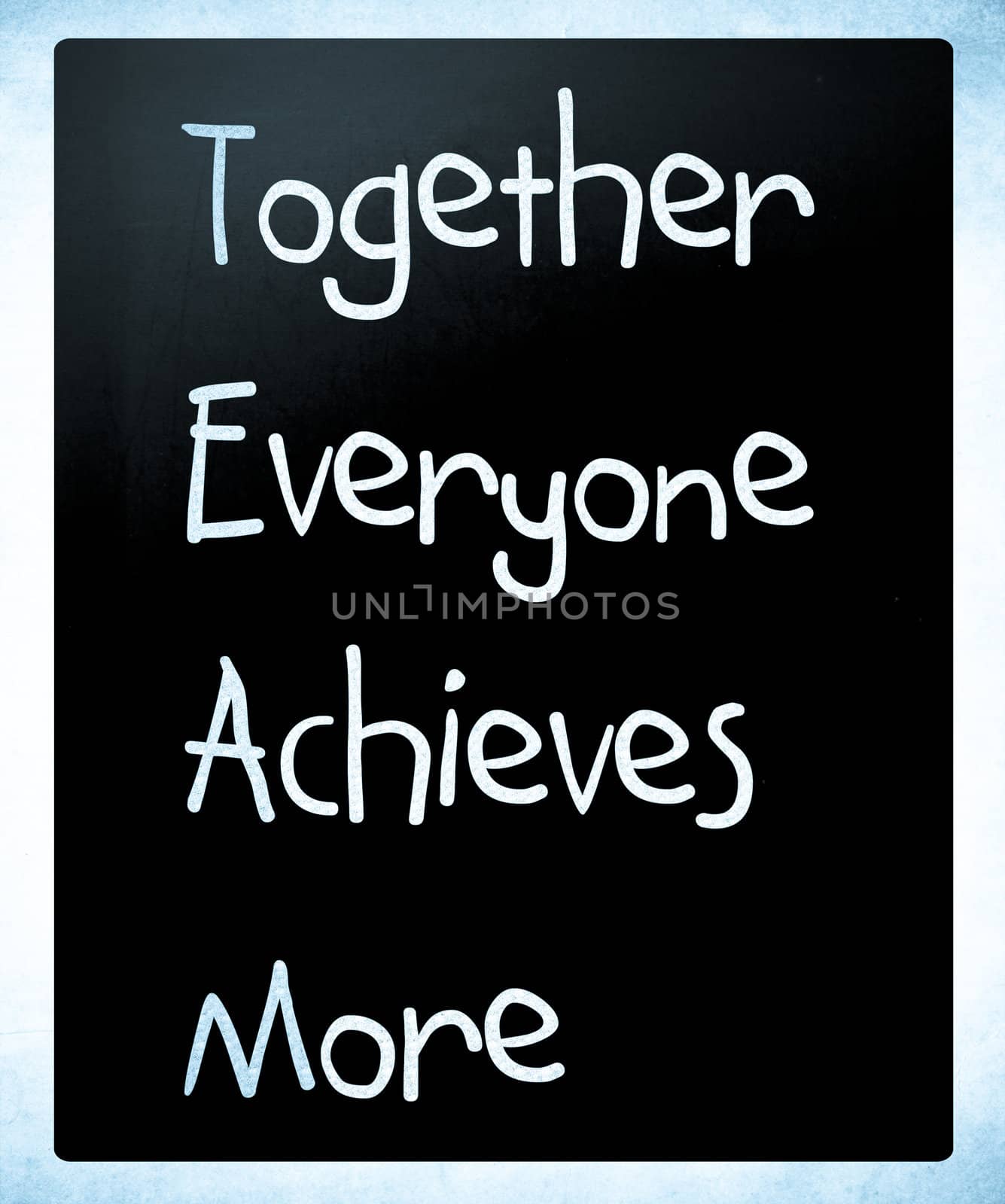TEAM acronym white chalk handwriting on blackboard