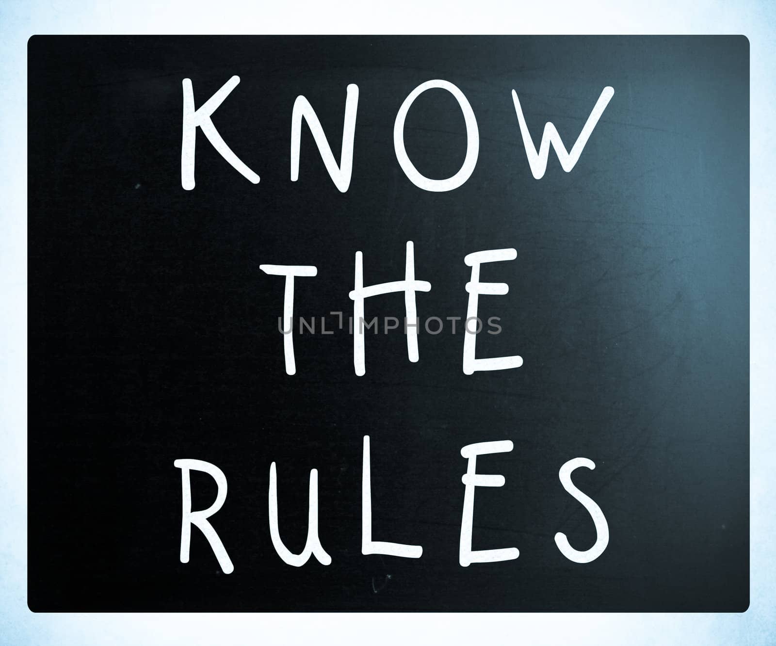 Know the rules - handwritten with white chalk on a blackboard