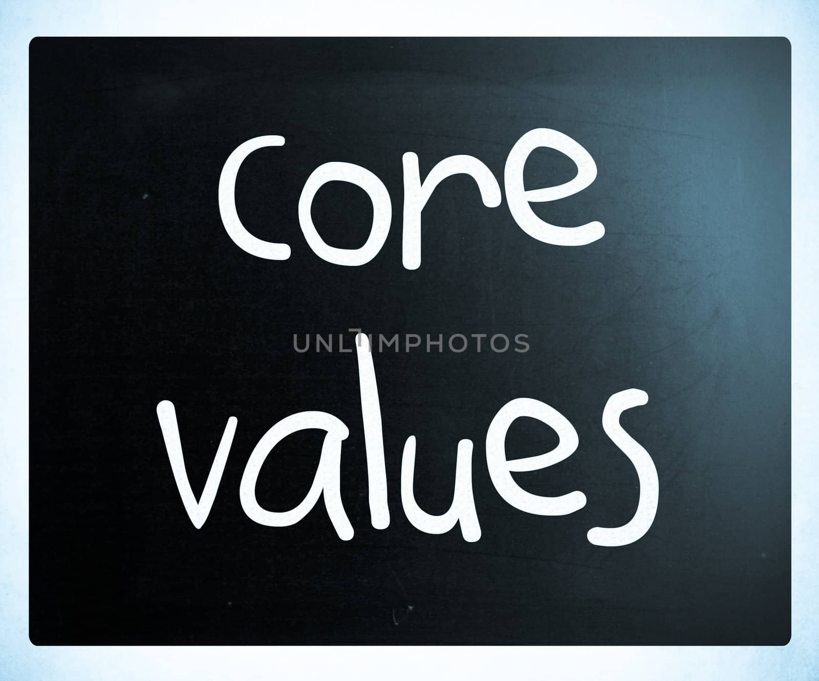 Ethics concept - core values handwritten with white chalk on a blackboard
