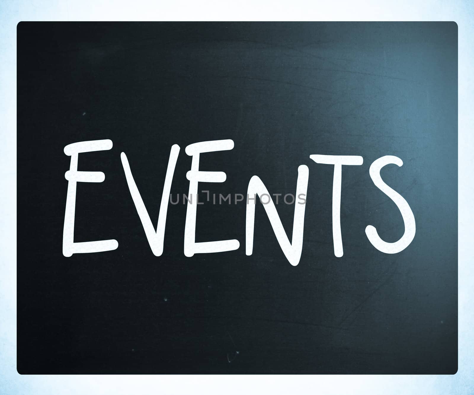 "Events" handwritten with white chalk on a blackboard