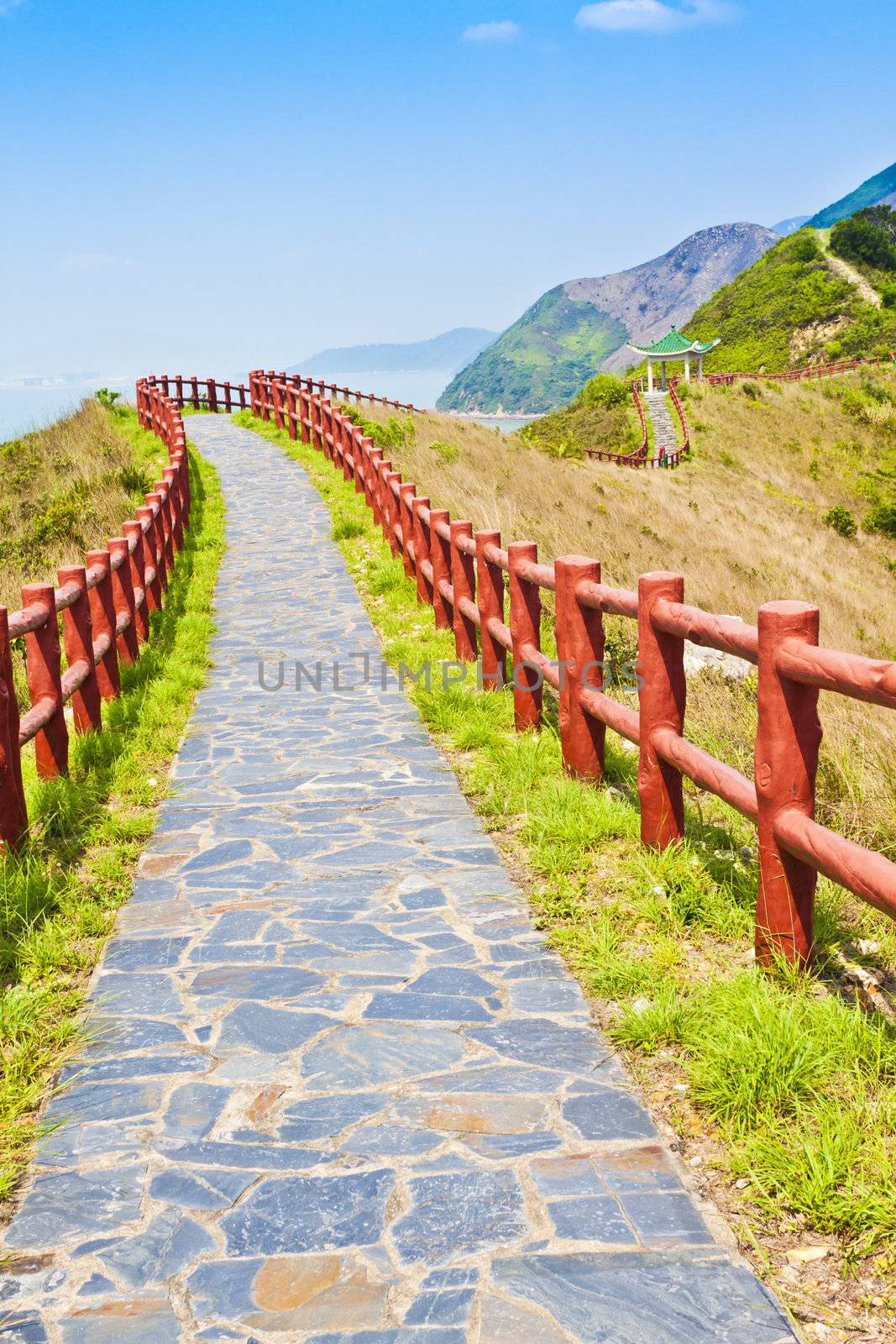 Hiking path and pavillion in mountain ridges by kawing921