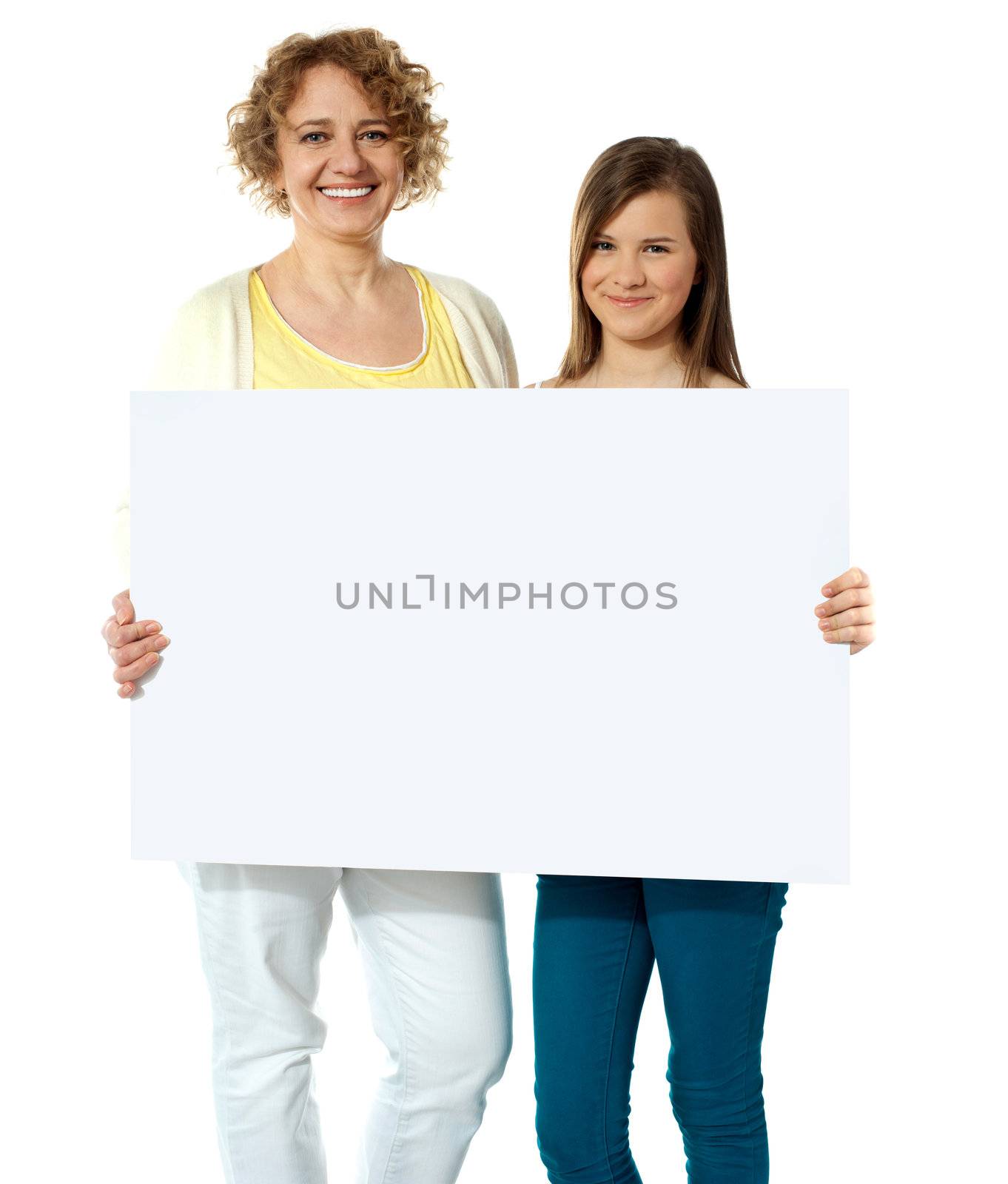 Pretty women posing with blank whiteboard, isolated