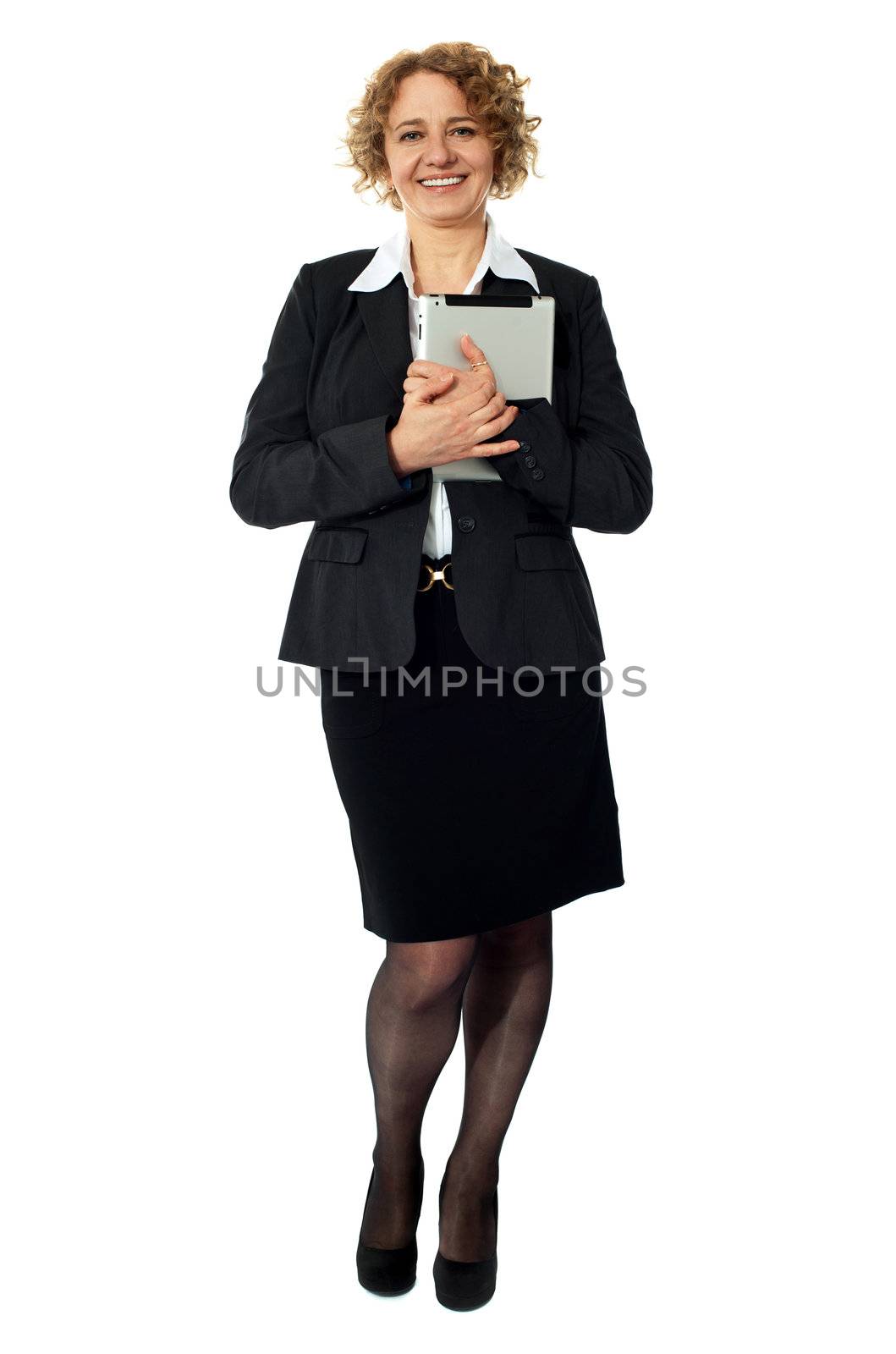 Female excutive holding apple i-pad by stockyimages