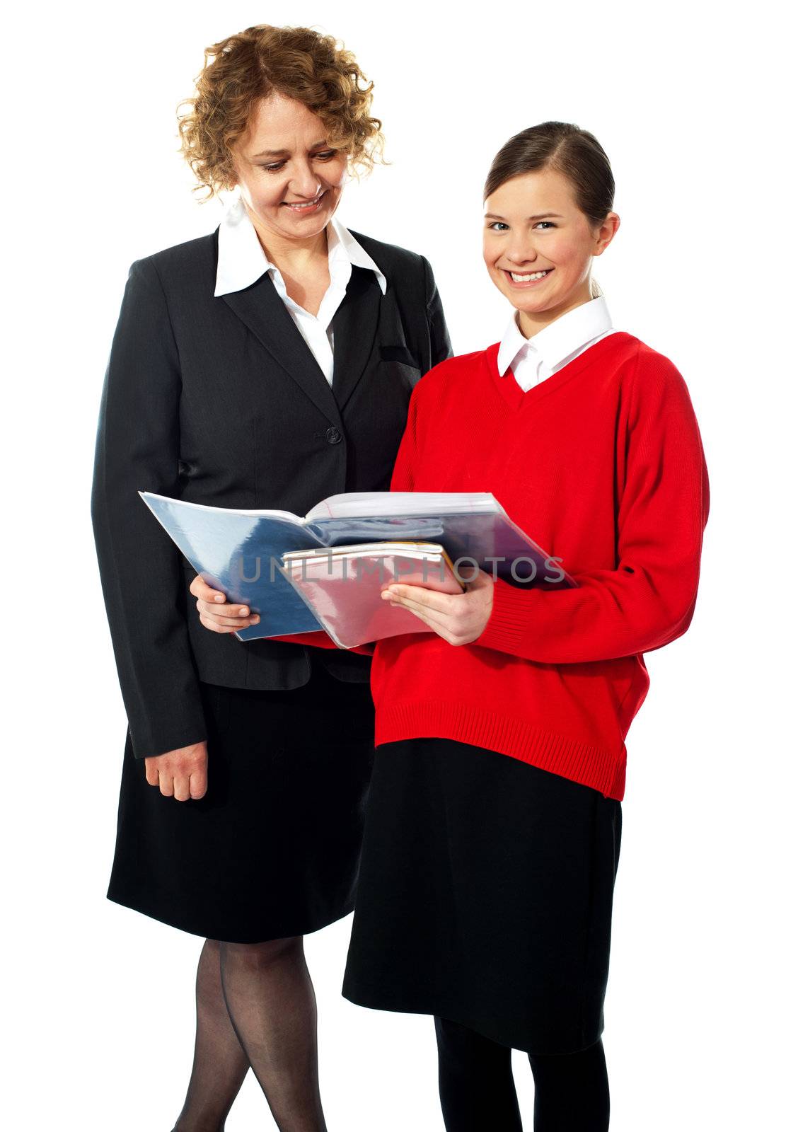 Beautiful child with teacher. Shot in studio. Isolated on white