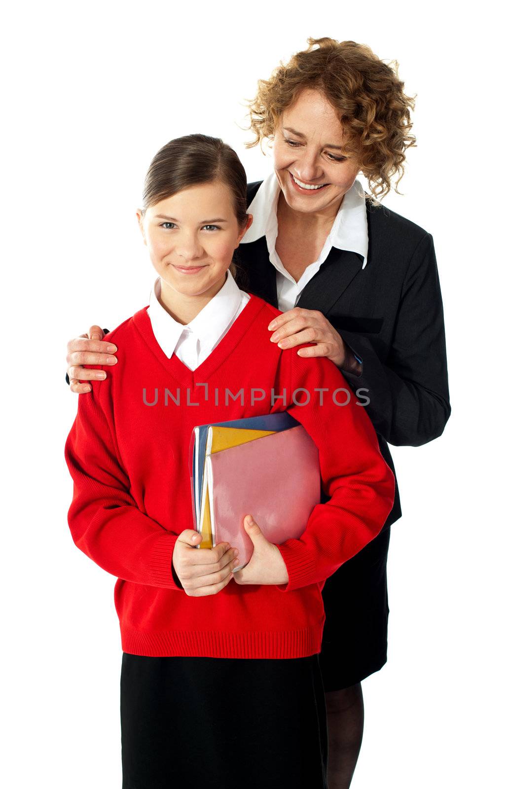 Teacher with teen student posing against white background, studio shot