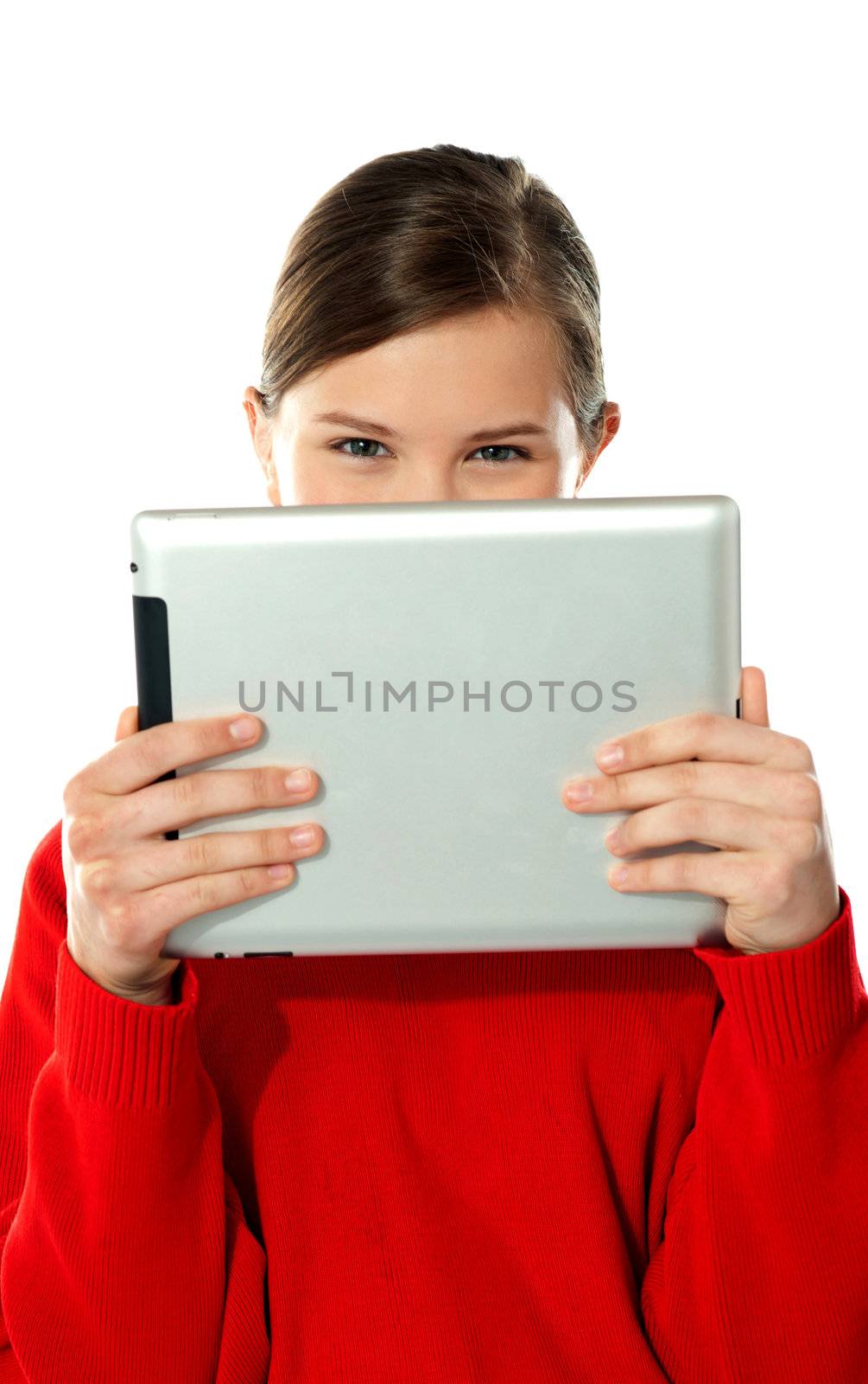 Beautiful girl hiding her face with touch pad by stockyimages
